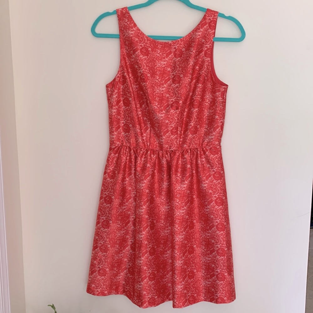 Limited Sleeveless Fit & Flare Floral Satin Print Dress with zipper and pockets.